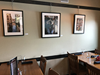 Chris Chapman shows his photograph at the Whetstone Restaurant & Brewery in Brattleboro.